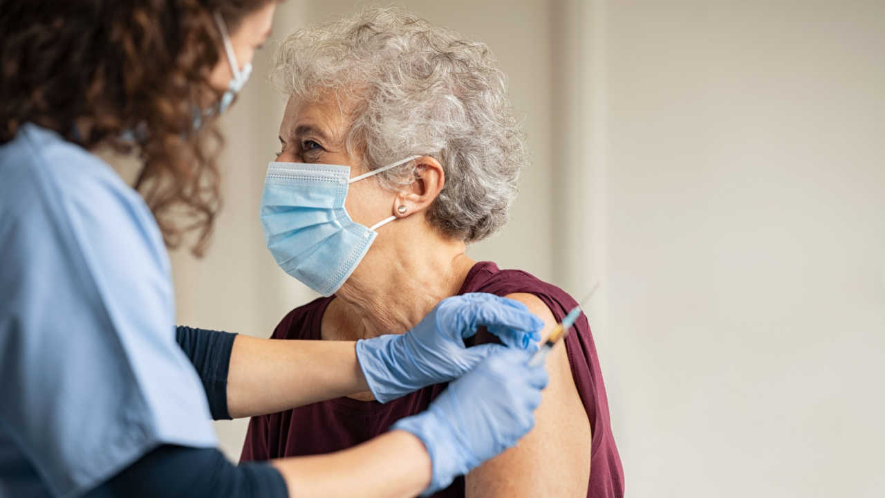 Woman gets vaccinated